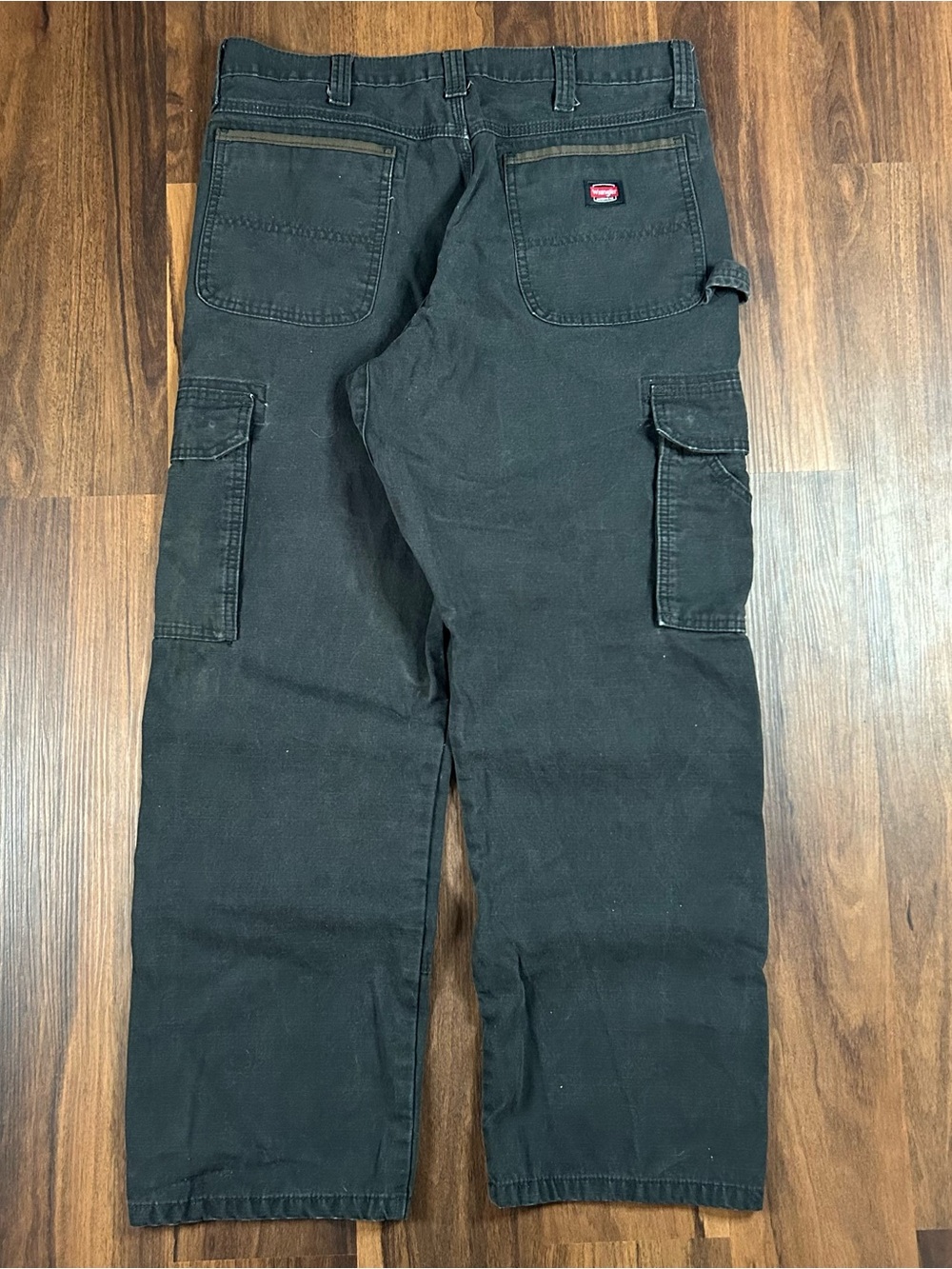 Wrangler Riggs Black Carpenter Utility Pants with brown canvas detailing